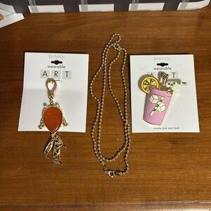 NWT Roman Wearable Art. Two Gold Tone Enhancer Pendants and a Chain. Signed RMN.